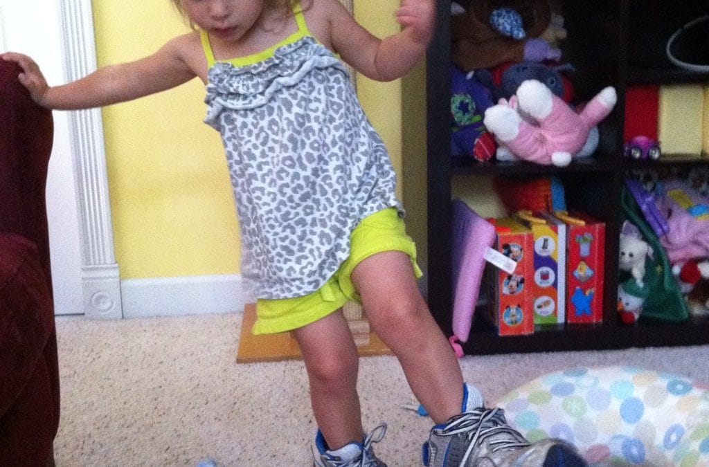 Wearing daddy’s shoes