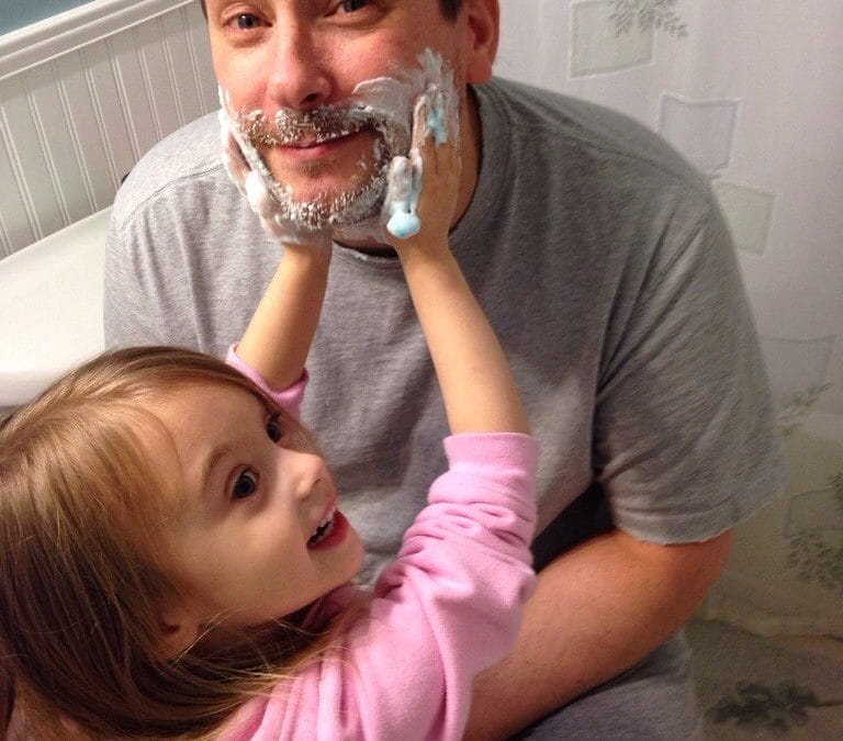 Helping daddy shave